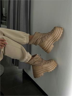 {{photo.Alt || photo.Description || 'Луноходы на высокой платформе, утеплённые D62'}}